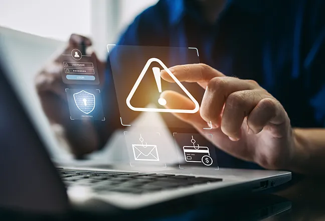 person infromt of laptop